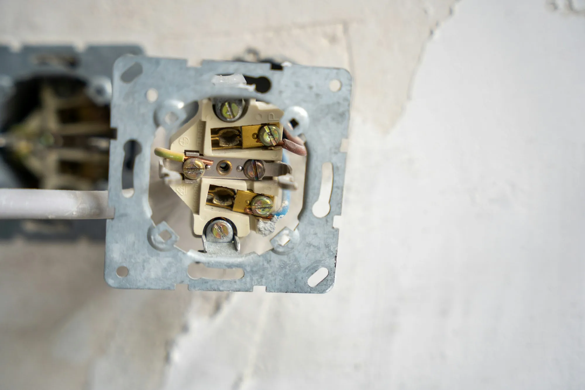 Newly installed outlet set into a white wall